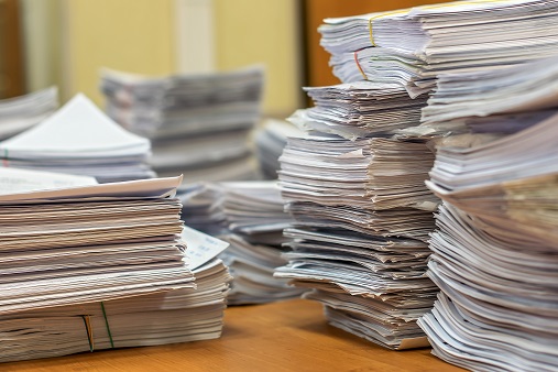 Stacks of paperwork - NLRB imposes remedies for repeat offenses